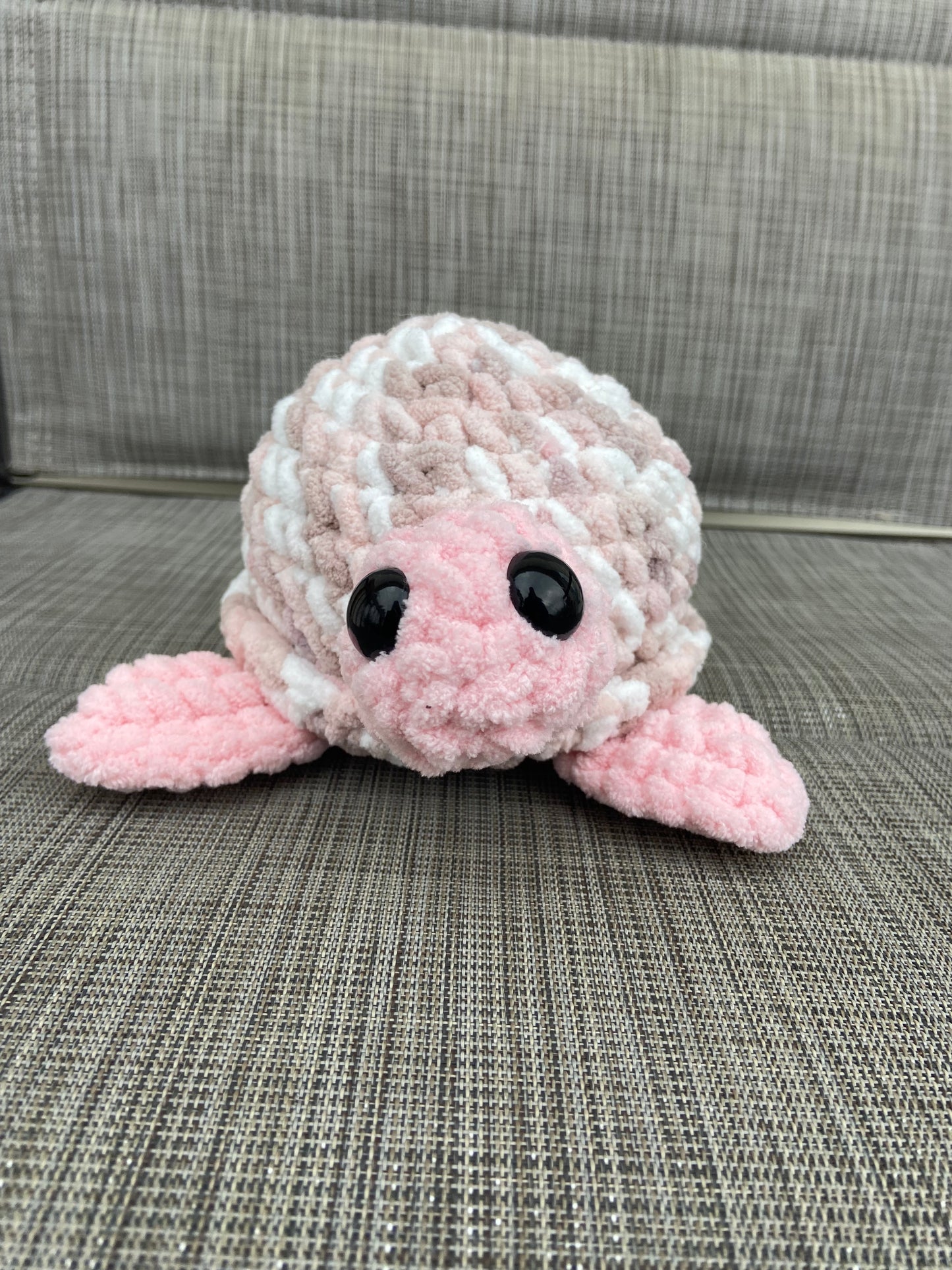 Amigurumi crochet turtle toy with shell