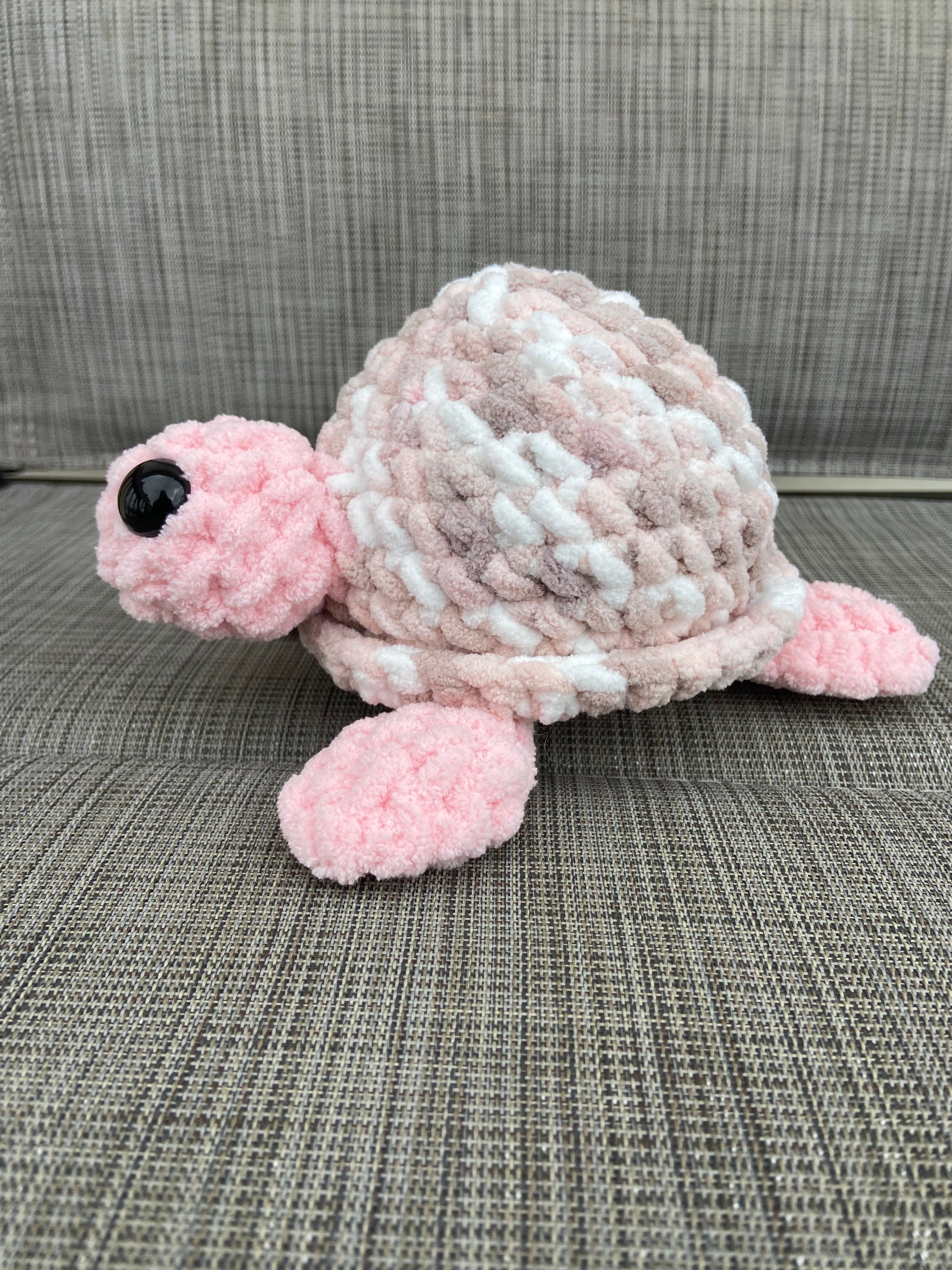 Adorable stuffed crochet turtle in vibrant colors
